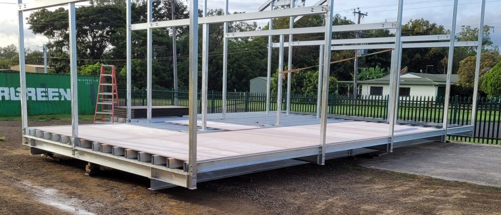 Modular steel base and floor framing during construction