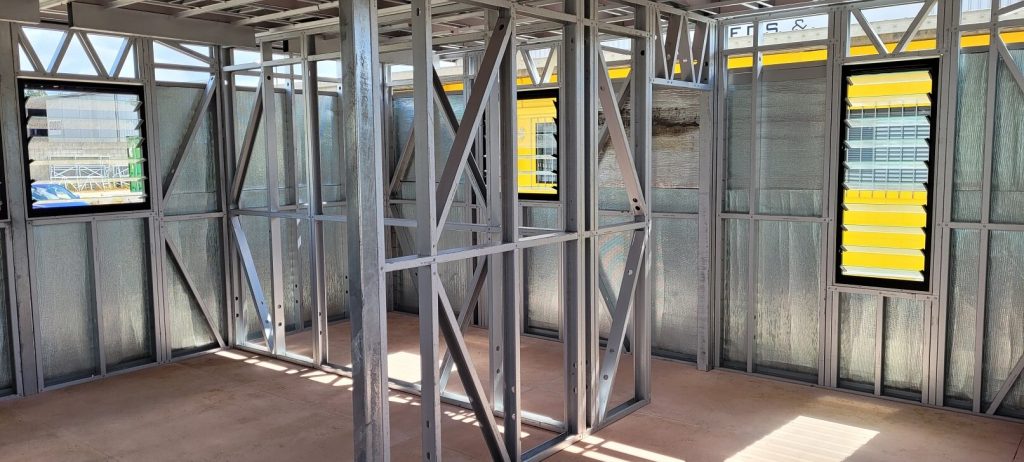 Internal view of window installation in a modular steel building